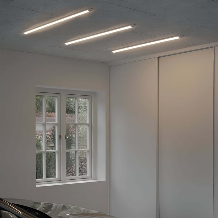 Batten Lights installed on a garage ceiling to provide bright, even illumination.