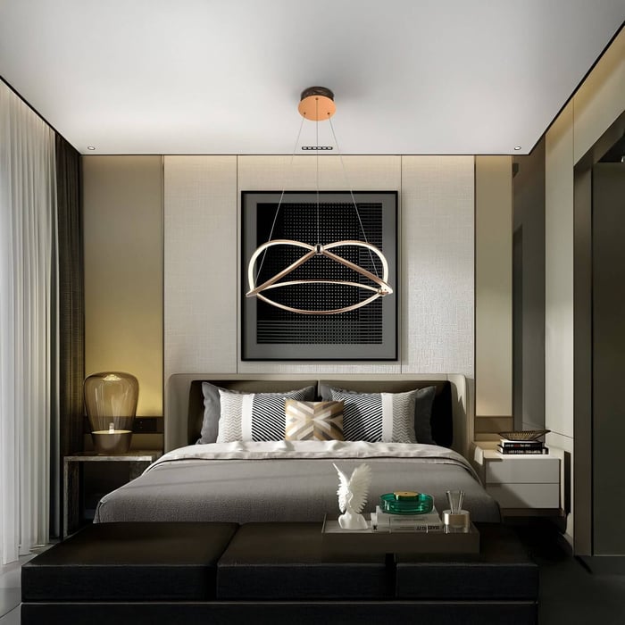 Modern bedroom with sculptural LED chandelier, black and white decor, and soft ambient lighting from wall niches.