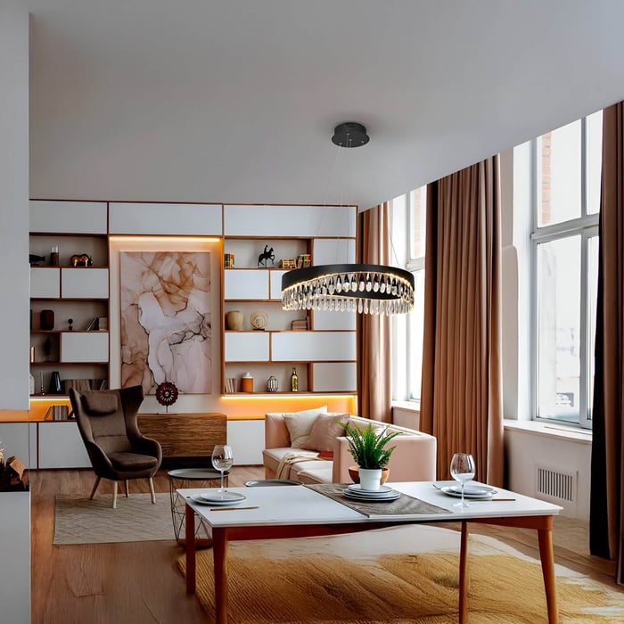 Contemporary room with circular pendant light, open shelving, and tall windows framed by floor-length beige curtains.
