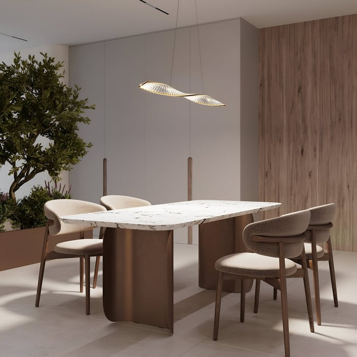 Modern dining space with marble table and sculptural pendant light above.