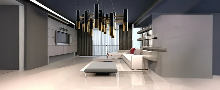Sleek modern living room with dramatic ceiling lighting featuring clustered black and gold pendant fixtures.
