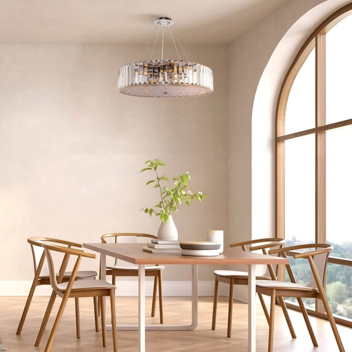 Scandinavian-style dining room with round chandelier, curved wood chairs, and a tall arched window letting in natural light.
