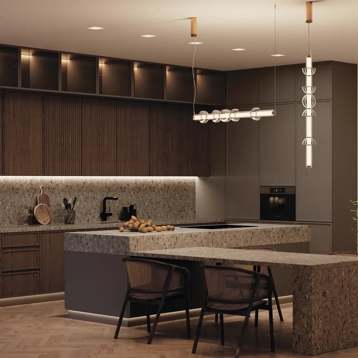 This cozy kitchen boasts sophisticated kitchen lights that complement the earthy stone countertops and rich wood cabinetry.