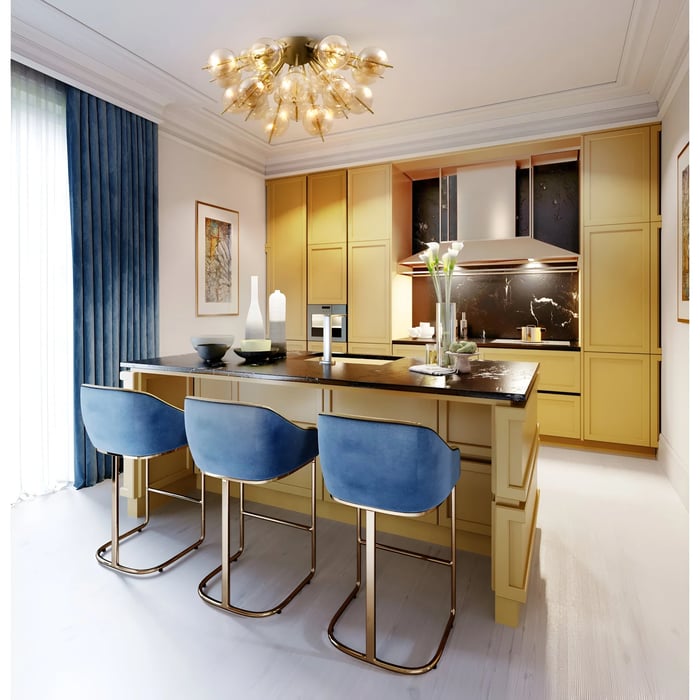Bright, colorful kitchen with a yellow island, blue chairs, and a bold statement ceiling light featuring multiple bulb-like structures.