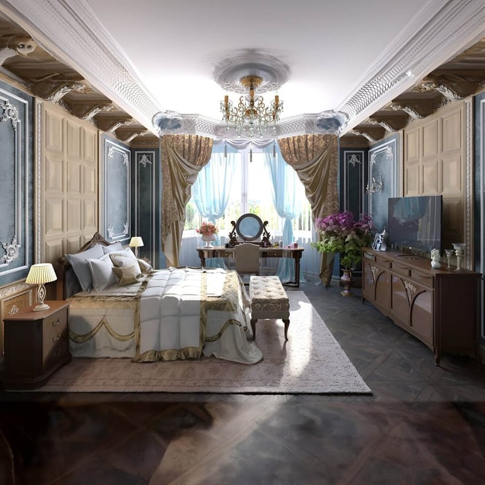 Traditional gold chandelier in a richly decorated bedroom with ceiling medallion and velvet drapery.