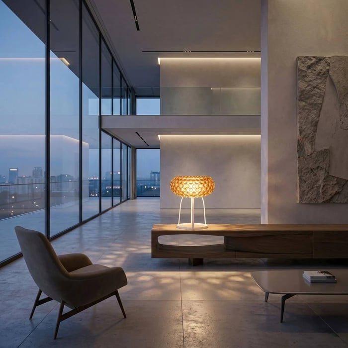An amber textured glass dome lamp on a low wooden bench, casting warm, dappled light patterns across a spacious minimalist apartment at dusk.