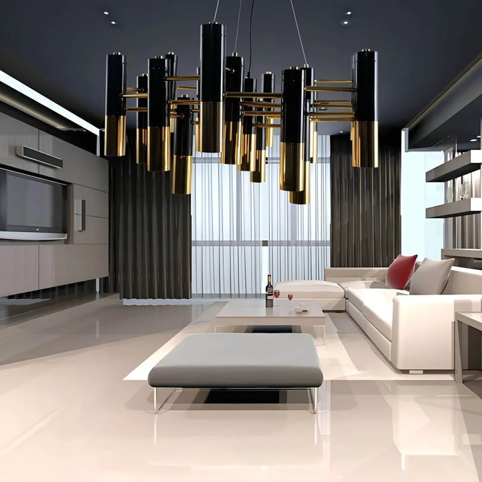 Contemporary black-and-gold cylinder chandelier suspended in a sleek modern lounge with glossy floors, dark curtains, and a sectional sofa.