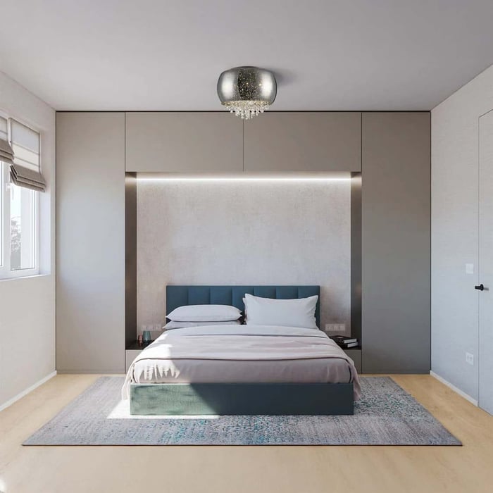 Minimal bedroom with a small ceiling light and hidden headboard LED strip, creating a soft glow behind the bed.