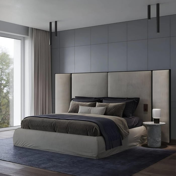 Modern grey bedroom with slim black tube ceiling lights and a small bedside lamp for calm, focused lighting.
