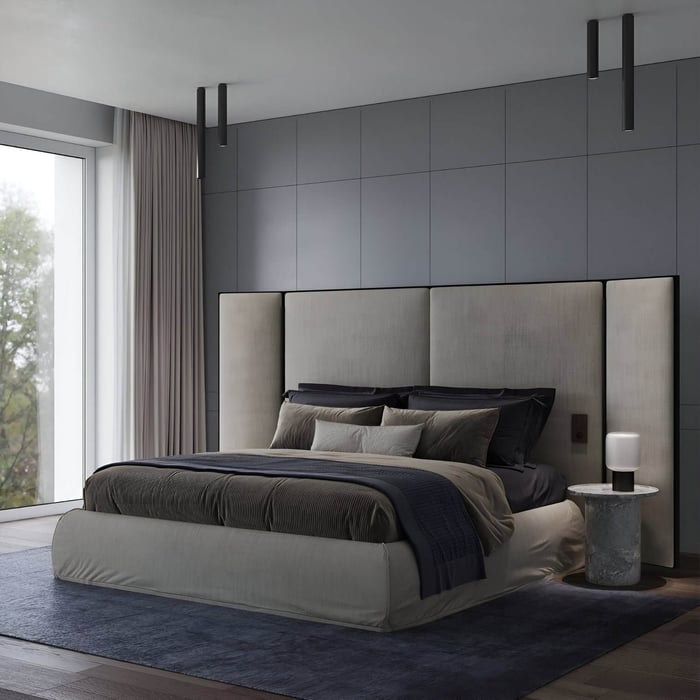 Minimalist bedroom with a tall upholstered headboard, neutral bedding, and sleek black ceiling-mounted downlights.