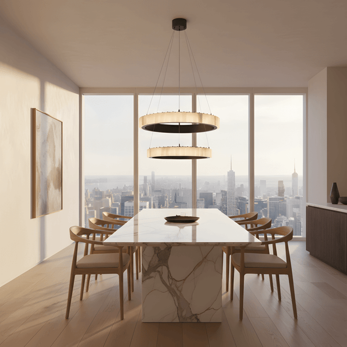 Contemporary dining room with double ring alabaster chandelier above marble table and panoramic city view.