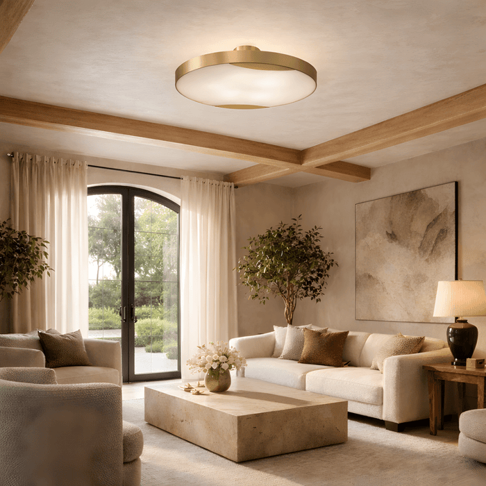 Contemporary living room with flush mount alabaster ceiling light, neutral sofas and natural wood beams.