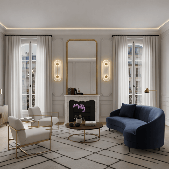 Elegant living room with tall rectangular mirror and alabaster wall lights flanking a fireplace.