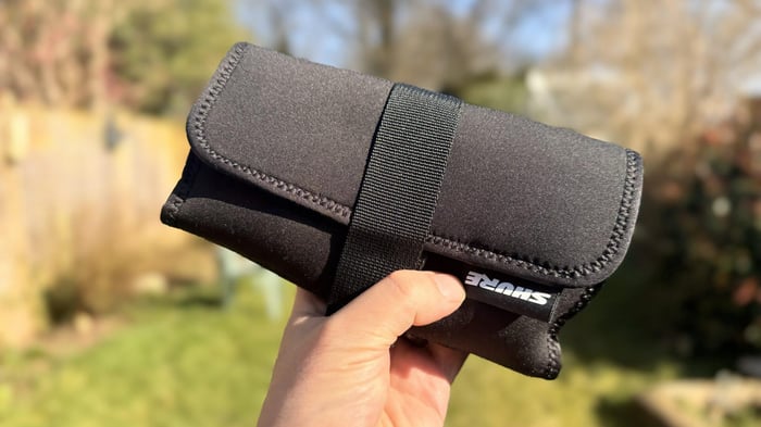 Shure MoveMic 88+ with accessories stored in a compact roll-up case