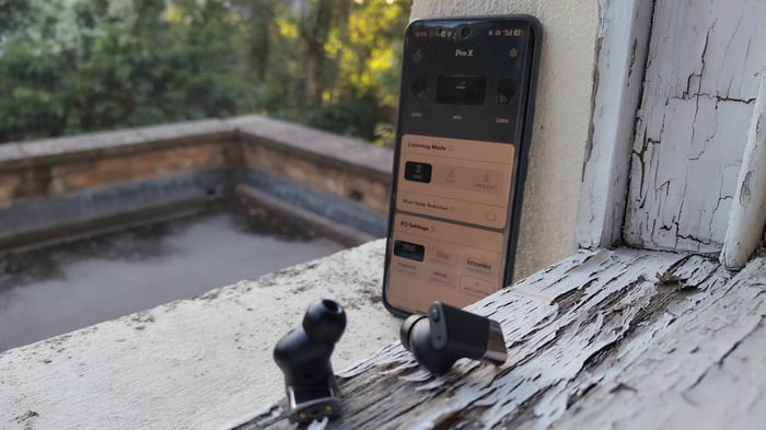 Another shot of the Pro X earbuds highlighting their refined aesthetics.