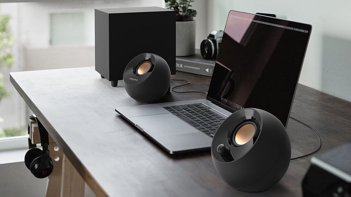 Creative Pebble Plus setup showing the compact subwoofer and satellite speakers