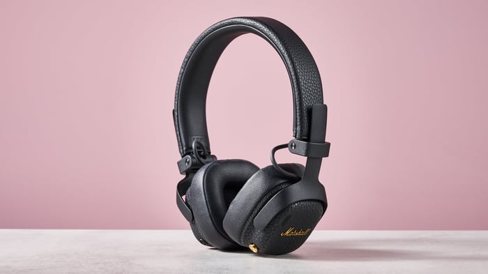 Marshall Milton ANC headphones against a pink background