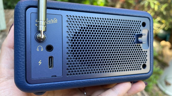 Back view of Roberts Revival Petite 2 held in hand