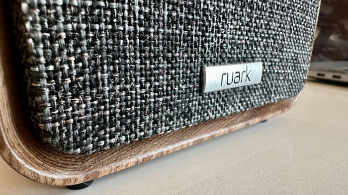 Fine craftsmanship visible in the fabric grille