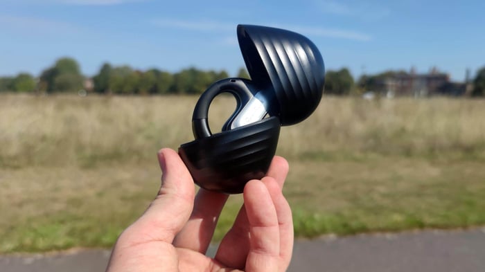 Charging case stores and powers up your earbuds, ready for your next workout.