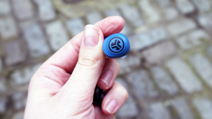 JLab Go Air earbuds resting in the open charging case