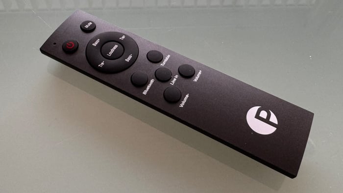 The included remote is sleek but tends to slip off armrests.