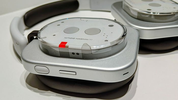 Side view highlighting the unique roller control mechanism.