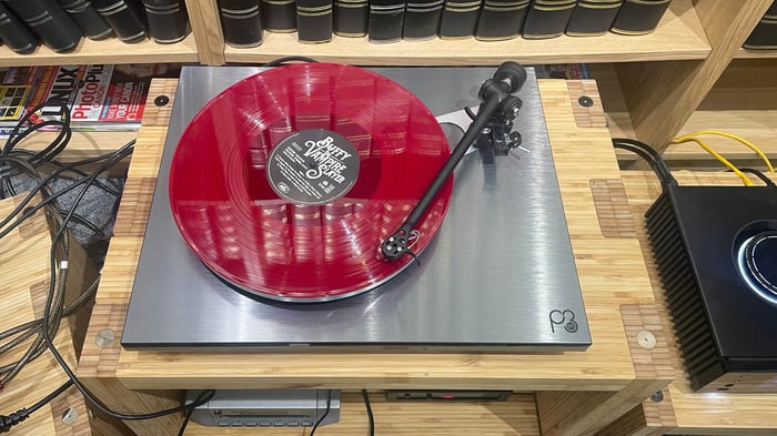 Rega Planar 3 RS Edition turntable playing pink vinyl