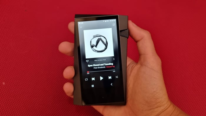 Astell & Kern A&norma SR35 close-up with headphones