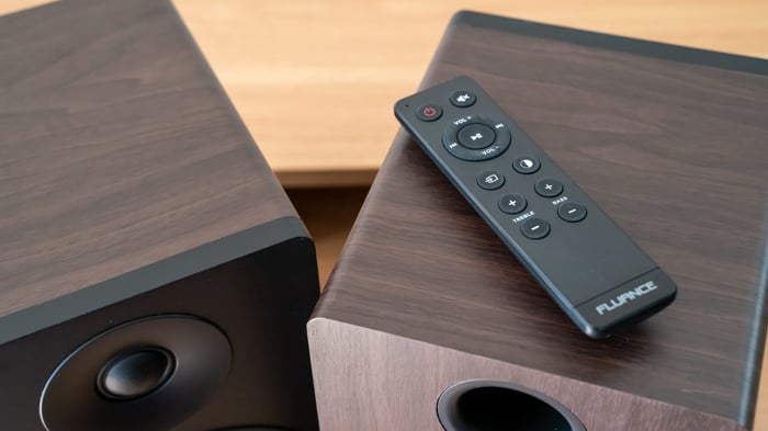 Fluance Ai41 speaker with connected devices on desk