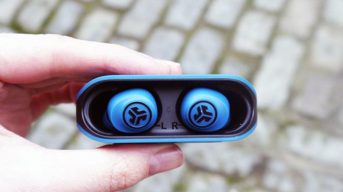 JLab Go Air earbuds reflective surface close-up