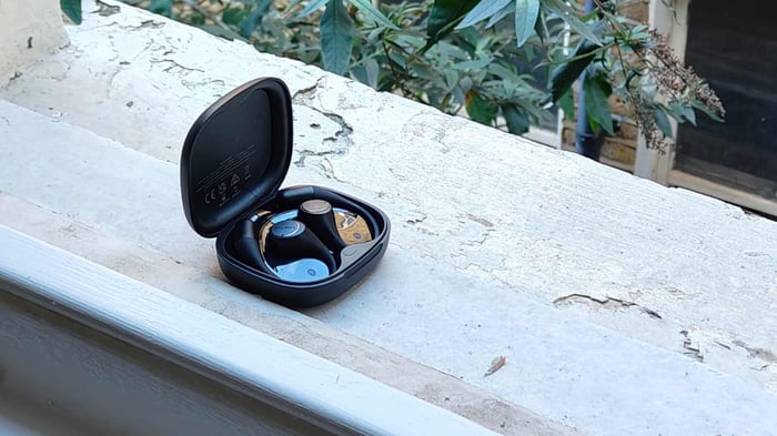 Open-ear design challenges sound isolation but offers unique listening experience.