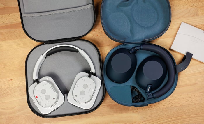Nothing Headphone (1) and Sony WH-1000XM6 carrying cases with open flaps