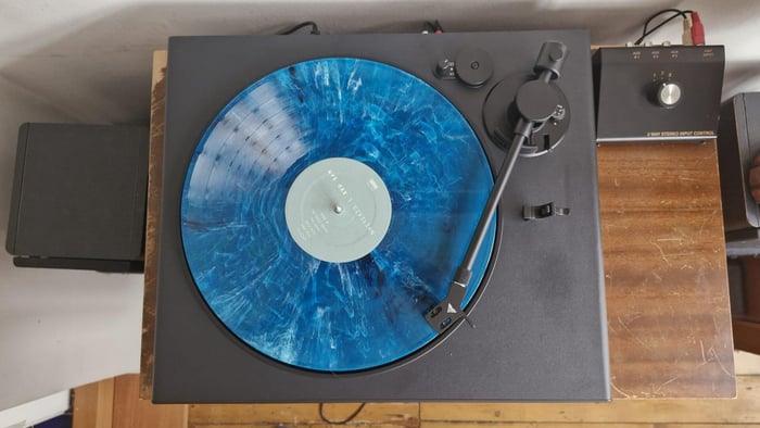Victrola Hi-Res Onyx on wooden surface