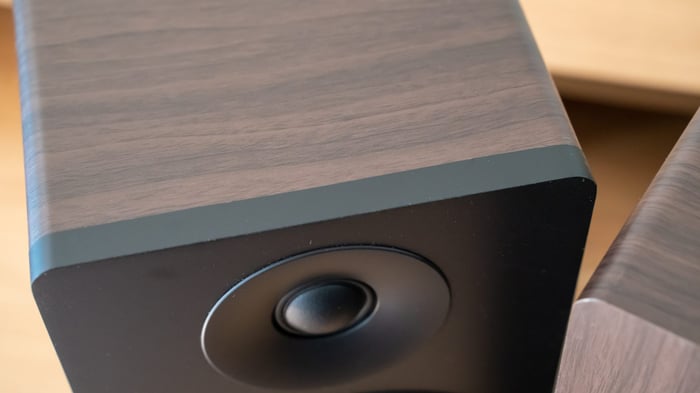 Fluance Ai41 speakers on desk with devices