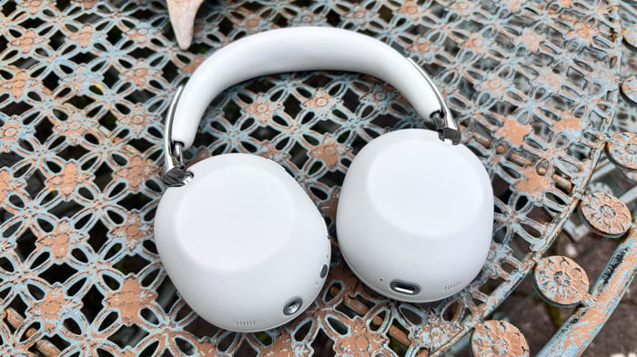 Sony 1000X The Collexion headphones lying earcup down on metal garden table