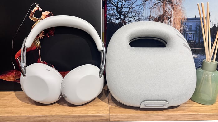 Sony 1000X The Collexion headphones on bookcase next to carry case
