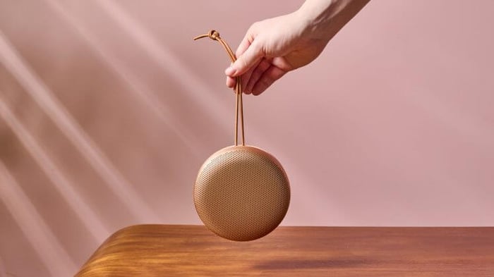 Holding the stylish Beosound A1