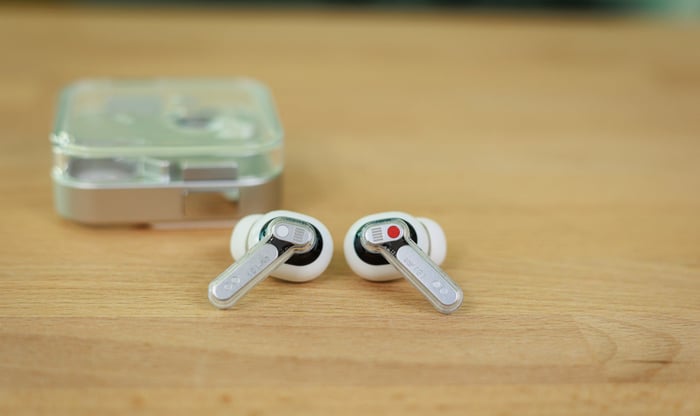 Nothing Ear (3) earbuds and case on stylish surface