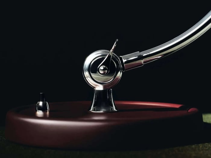 Detailed view of burgundy lamp and turntable