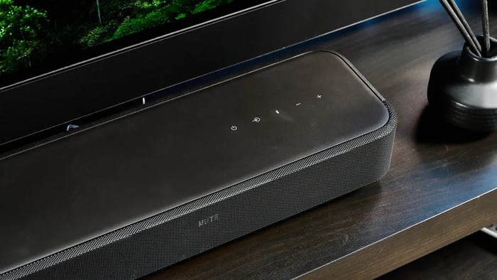 Top panel houses tactile and touch controls with a premium matte finish