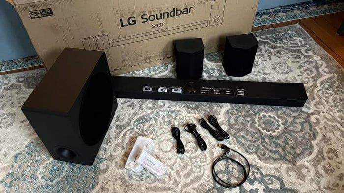 LG S95TR in a cozy living room setup.