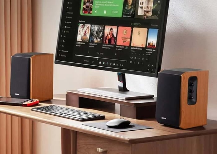 Edifier R1000TC II desktop speakers with leather-textured front panels and wood-style sides
