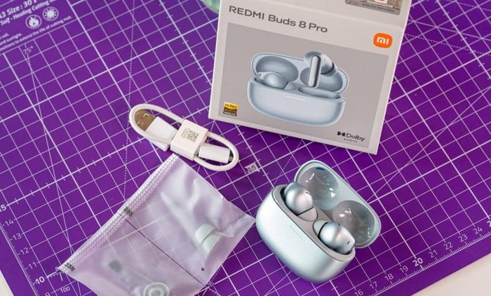 Detailed view of Redmi Buds 8 Pro’s glossy sensor area and sleek design