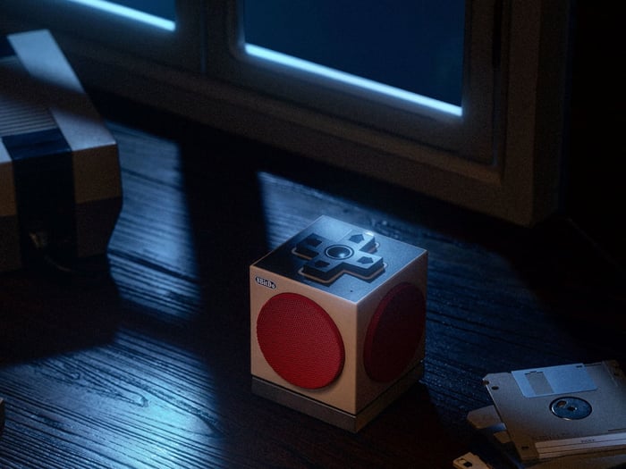 Top view of the speaker showing D-pad controls