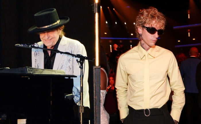 Bob Dylan and MGK. Credits - Matthew Baker/Getty Images and Christopher Polk/Billboard via Getty Images