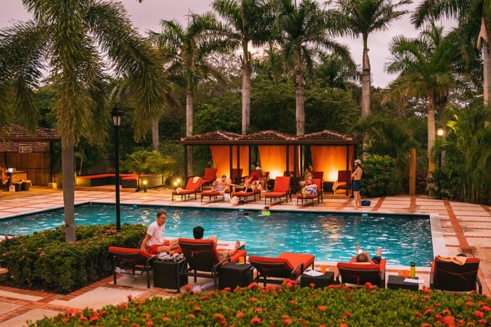 Guests enjoying the tranquil saltwater pool at Rythmia luxury retreat