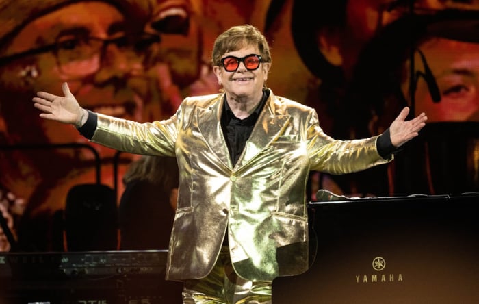Elton John wearing gold suit at Glastonbury in 2023