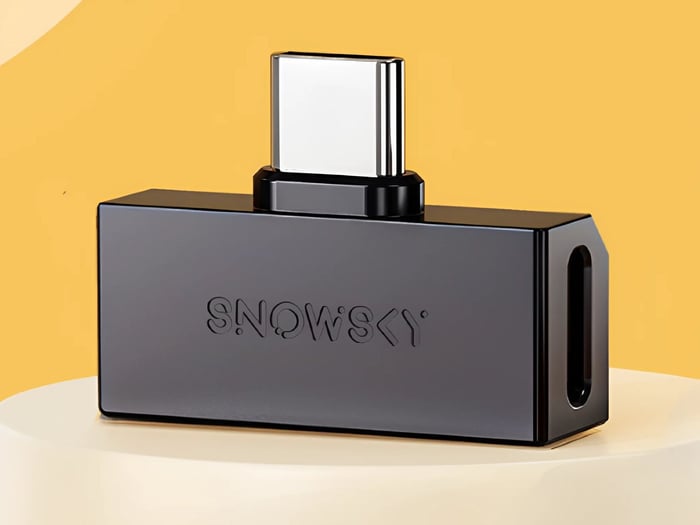Close-up of Fiio Snosky TINY dongle DAC showcasing its sleek design