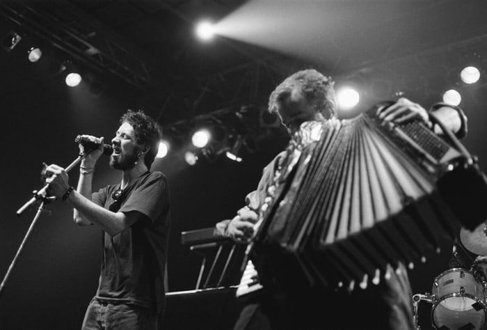 The Pogues performing in Amsterdam on November 4, 1989. (Credit: Frans Schellekens/Redferns)